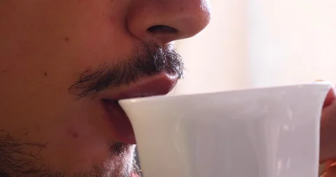 Morning coffee in mug drinking close up Video stock 101739798