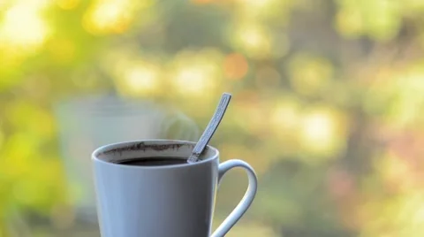 Morning coffee with a spoon.  Stock-Footage 67359843