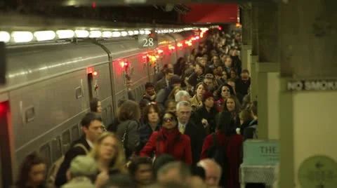Morning commute crowd of businessmen and women train fast time lapse Stock Footage