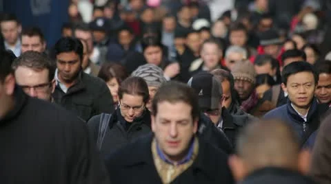 Morning commuters crowd of people walking going to work slow motion Stock Footage