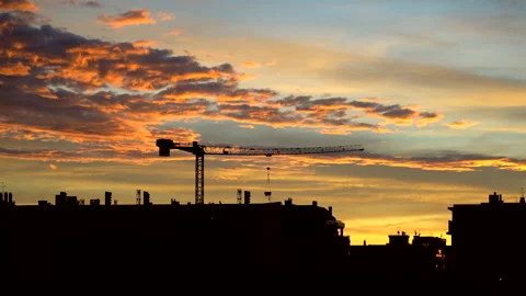 Morning construction activity with crane Stock Footage 261731013