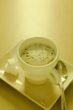 Morning cup of coffee with sugar. Stock Photos