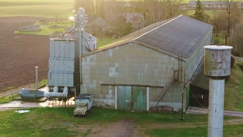 Morning Drone View of Soviet Farm Legacy and Modern Agriculture in Rural Latvia Stock Footage 342781003