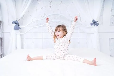 Morning exercise in bed Stock Photos