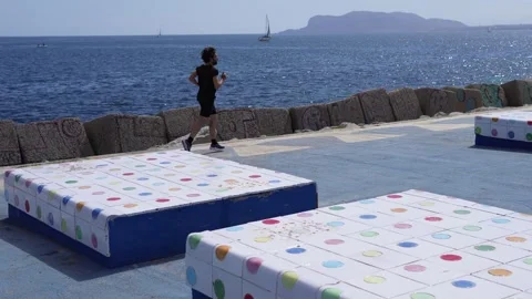 Morning exercise by the sea Stock Footage 308187975