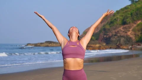 Morning exercises on the beach Stock Footage 265879765