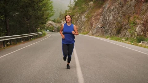 Morning Woman running on empty Stock Video Pond5 - Main Image