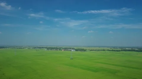 Morning Light and Clouds Over Rice Paddies in Lamongan June 5 2026 Stock Footage 336695446