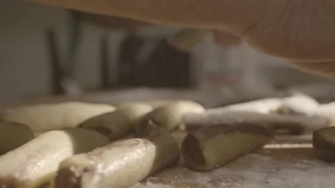 Morning light on hands rolling cookie dough at home Stock Footage 320068384