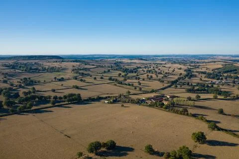 Morning light over patchwork countryside fields 스톡 사진