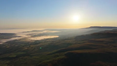 Morning Light Shining Down on South Wales Landscape with High Mountains of Stockbeeldmateriaal 345102754
