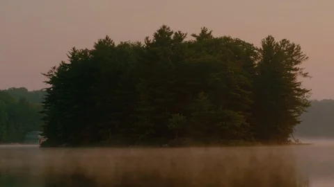 Morning Mist on Island Lake Stock Footage 113215744