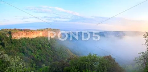Morning misty view from top of mangup ancient settlement Stock Photos