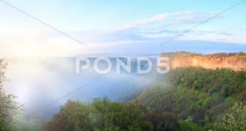 Morning misty view from top of mangup ancient settlement Stock Photos