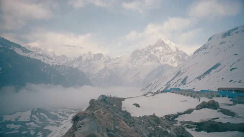 In The morning mountain covered snow with cloud and mist in the valley on ABC Stock Footage 154017671
