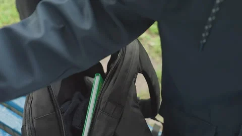 Morning scene of student readying backpack with school supplies. Student Stock Footage 338282564