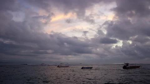 Morning Sea View with Floating Clouds Reflecting Sunrise Colors Timelapse Stock Footage 199372315
