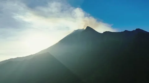 Morning Sun Rays Breaking Through Tropical Mountain Clouds Stock Footage 341353498
