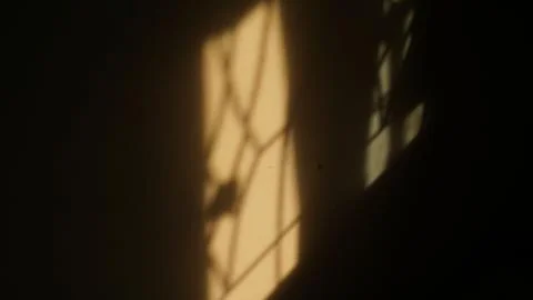 Morning Sunlight Patterns Reflected on Bedroom Wall Foto stock