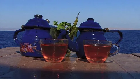 Morning tea on the beach Stock Footage 112003264