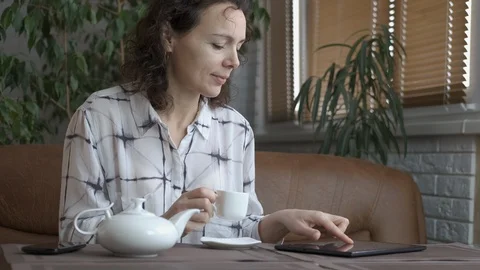 Morning tea with internet. Stock Footage 107561088