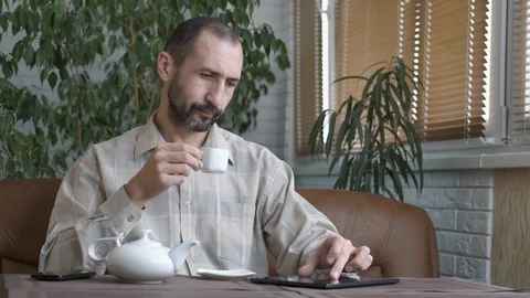 Morning tea with internet. Stock Footage 107561264