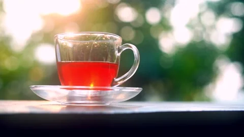 Morning tea on table with sunny background 動画素材 219668989