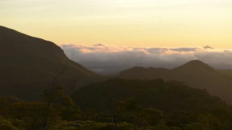 Morning time lapse with clouds drifting underneath Stock Footage 40341475