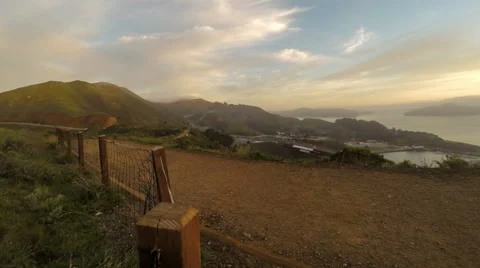 Morning time lapse of clouds, traffic near the Golden Gate bridge camera tilt Stock Footage 43368375