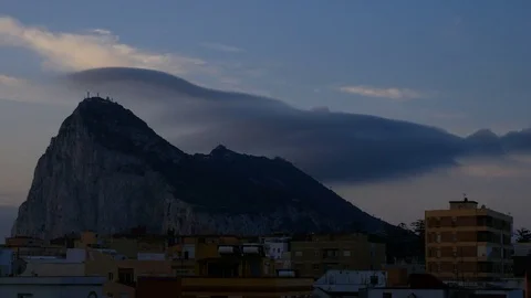 Morning timelapse of impressive cloud formation above the Gibraltar Rock and La  Stock Footage 73745123