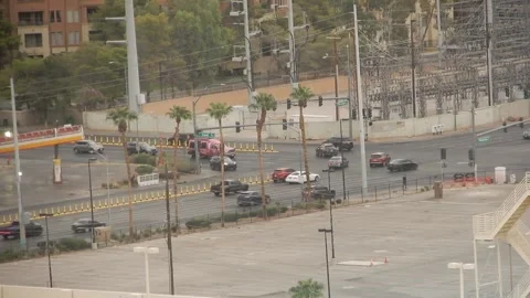 Morning Traffic Flows Through Las Vegas Near Electrical Power Grid 스톡 동영상 316612000