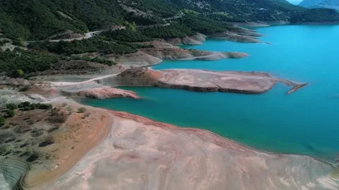 Mornos Lake with cows Stock Footage 237912632
