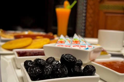 Moroccan breakfast served inside a luxurious riad in the old medina of Fez Stock Photos