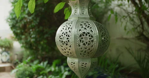 Moroccan chandelier hanging of a tree Stock Footage 143089648