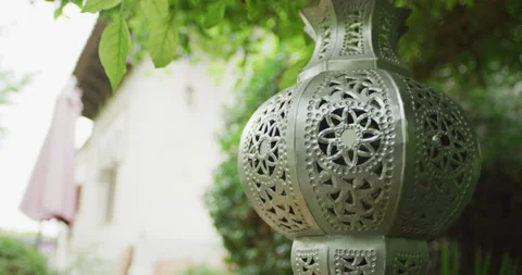 Moroccan chandelier hanging of a tree smooth movement Stock Footage 143089677
