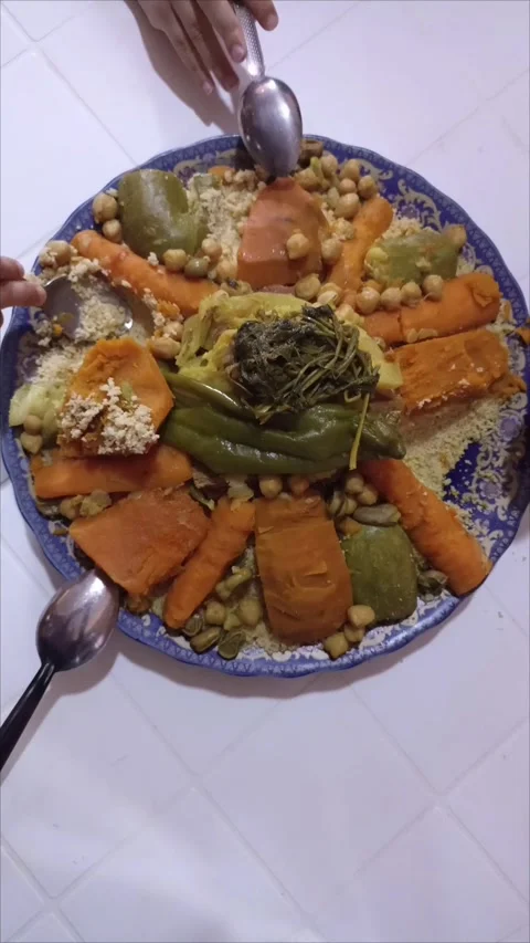 Moroccan Couscous Series - Final Part: Authentic Family Serving &amp; Tasting Stock Footage 333865964