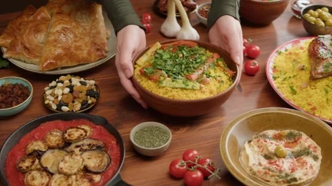 Moroccan Cuisine with Hands Serving Couscous. Stock Footage 305808129