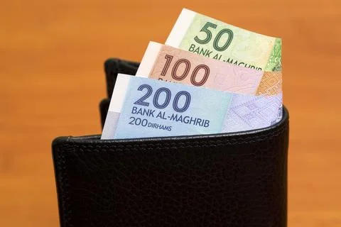 Moroccan dirham in the black wallet Stock Photos