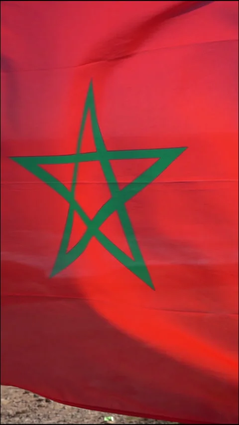 Moroccan flag waving under the sun outdoor on windy weather Stock Footage 296753768
