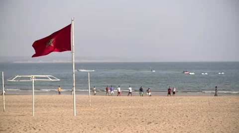 The Moroccan flag waving in wind on the beach Stock Footage 68693048