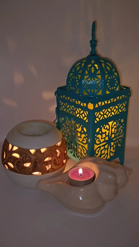 Moroccan lamp with candle and reflections of light Stock Footage 329888853