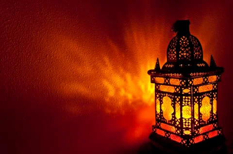 Moroccan lantern with gold colored glass in horizontal position Stock Photos