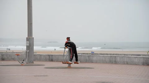 A Moroccan man exercises in a rack Stock Footage 44782983