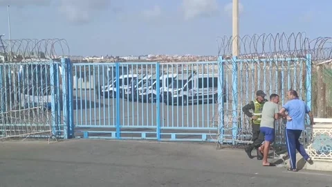 Moroccan security forces remain on the border with Ceuta after mass migration at Stock Footage 284767965