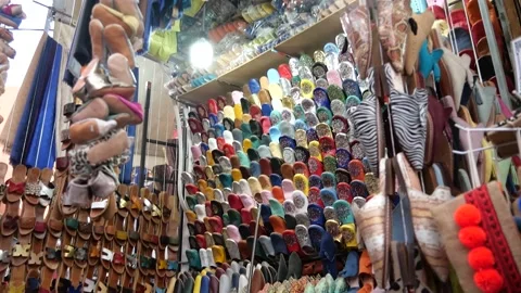 Moroccan shoes in the souk Marrakech Video stock 132343379