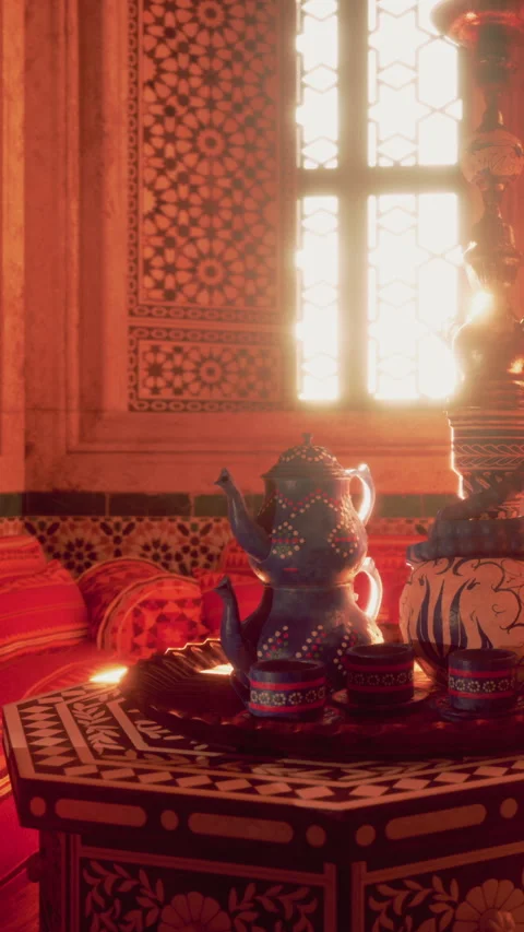Moroccan tea set on a table in a sunlit room with patterned walls Stock Footage 340890860