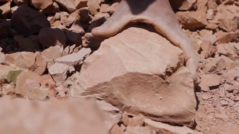 Moroccan worker hitting raw clay  Stock Footage 124589979