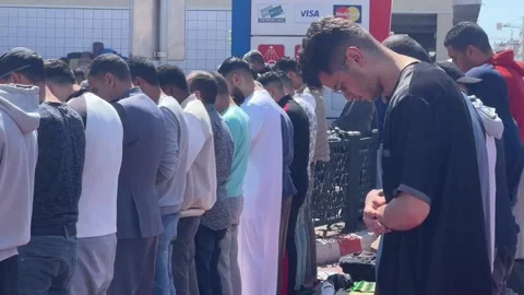 Moroccans praying during first Friday of Ramadan in Rabat, Rabat, MA - 24 Mar 20 Stock Footage 236704038