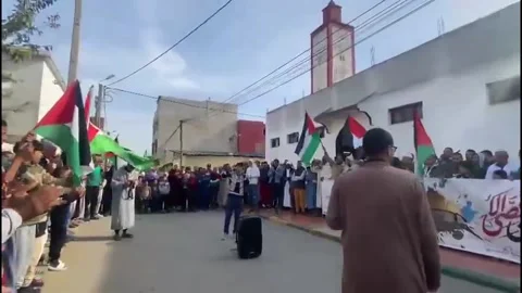 Morocco: Moroccans staged a vigil today to protest the Israeli attacks ag... Stock Footage 296846178