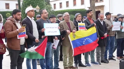 Morocco: Protesters gather in Rabat against US intervention in Venezuela Stock Footage 325746726